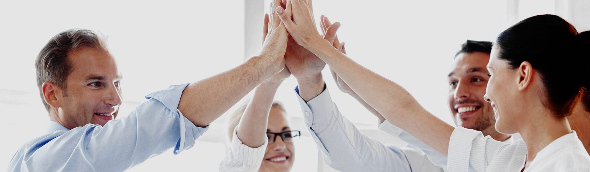 happy-business-team-giving-high-five happy-business-team-giving-high-five